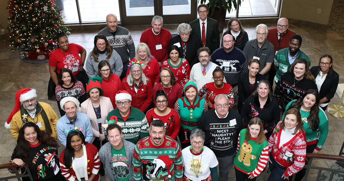 BOG group photo in festive sweaters