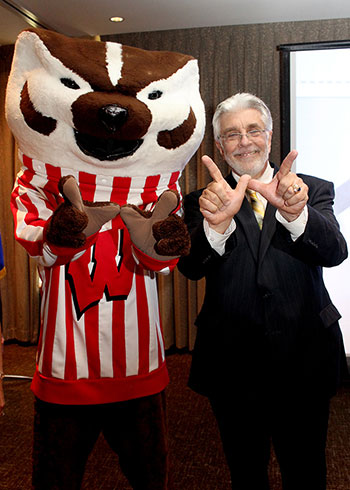 Ralph Cagle celebrating his presidential  swearing-in with Bucky Badger