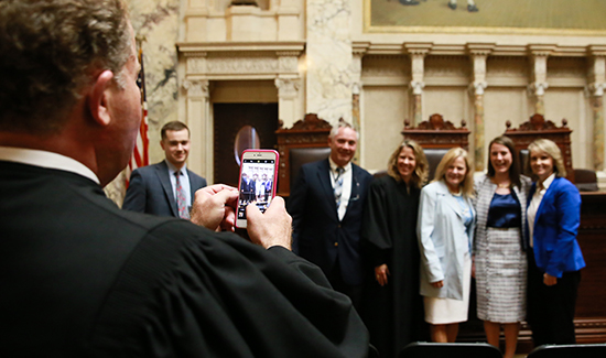 Justice Daniel Kelly takes a photo