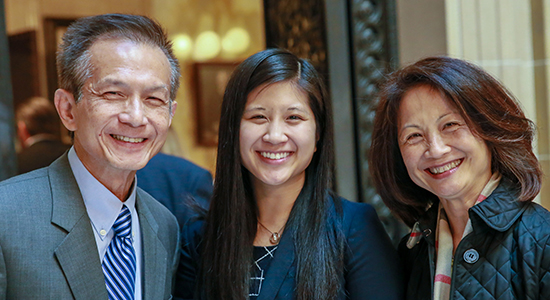 Kristen Chang, center, with her parents Stephen and Vivienne Chang.