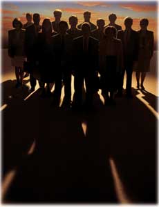 a group of people in shadow