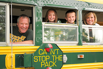 Bob Gagan and family in Packers bus