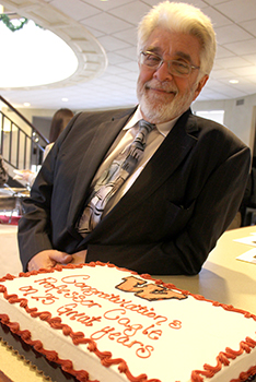 Ralph Cagle with retirement cake
