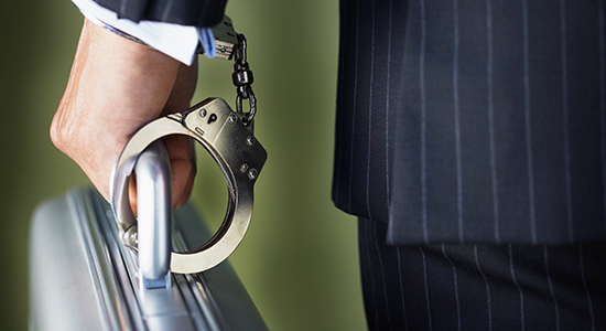 briefcase handcuffed to businessman