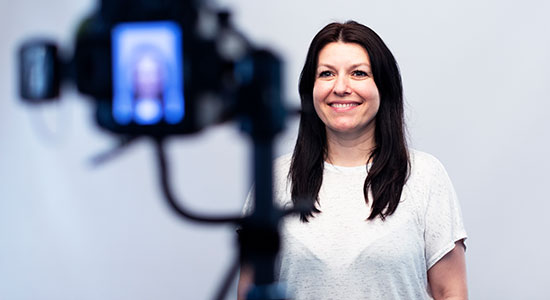woman in front of camera