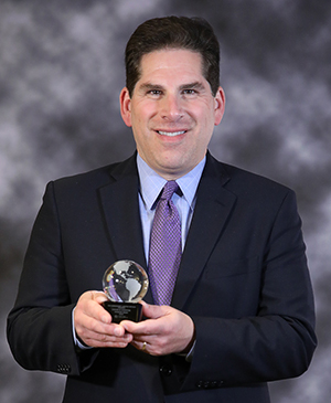 Steven Schuster with award