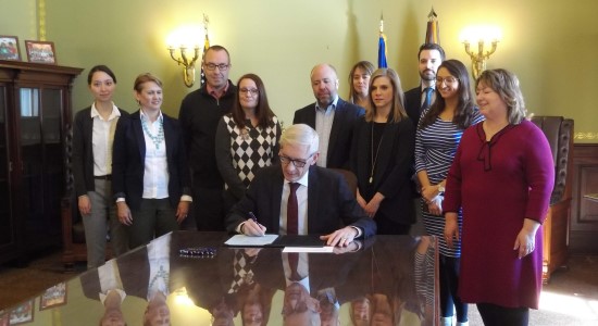 Gov Tony Evers signing 2019 Wisconsin Act 109