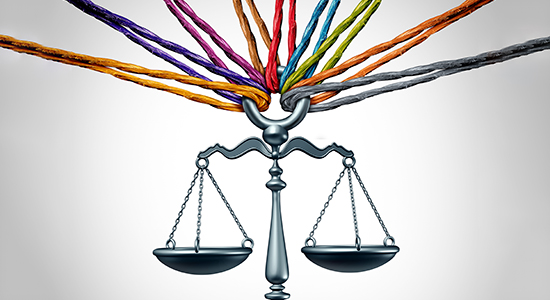 Many colored ropes tied to scales of justice