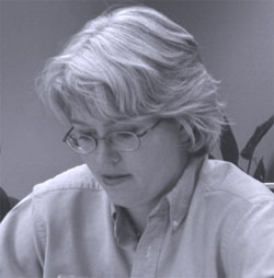 Gov.Gwendolyn Connolly of Milwaukee studies     board issues.