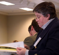 Photo: Gov. Deborah M. Smith reviews   materials at board meeting.