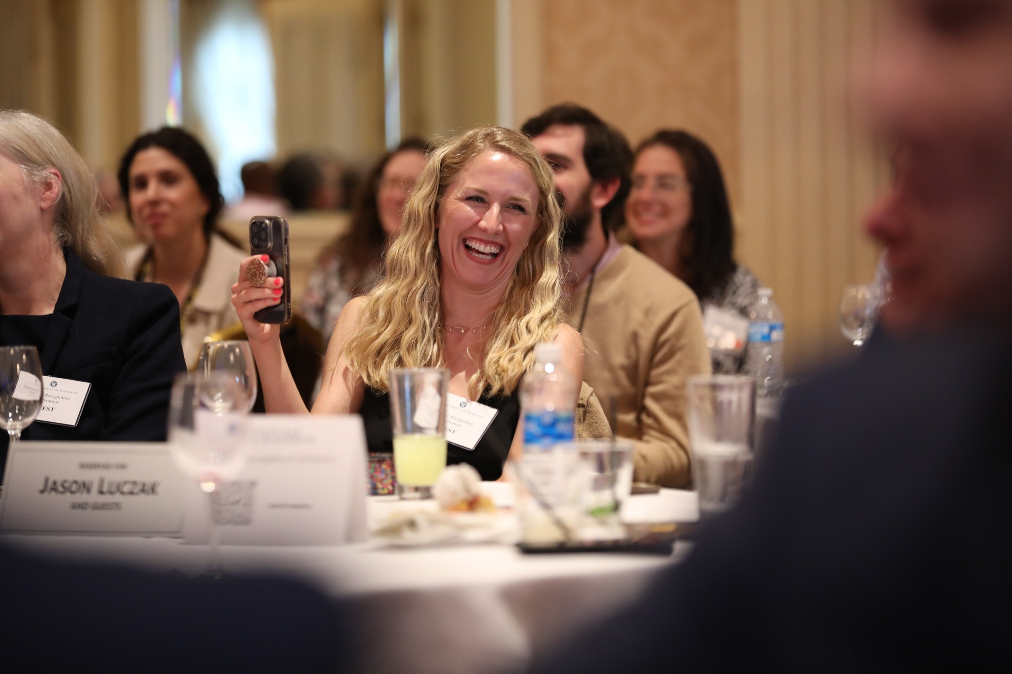 Lawyer smiling during MRC dinner