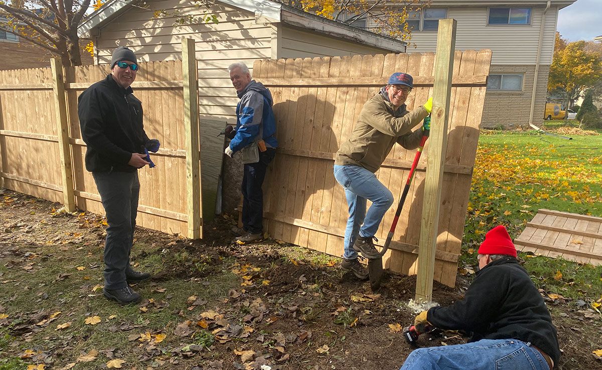 fence-building volunteers