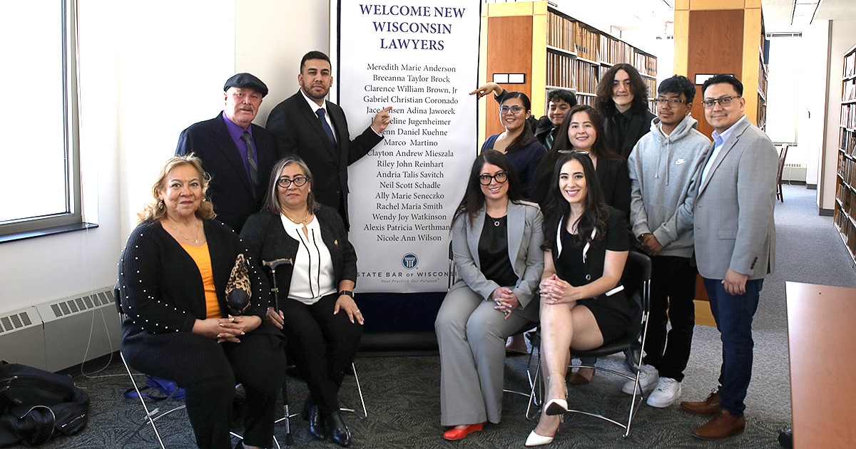 family and friends pose for photo with Gabriel Coronado