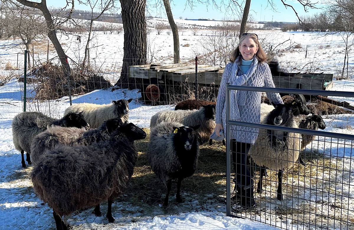 Tracey Schwalbe with sheep