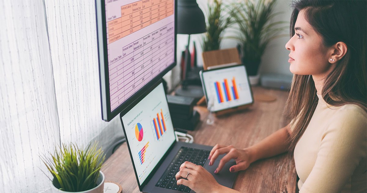 businesswoman looking at reports