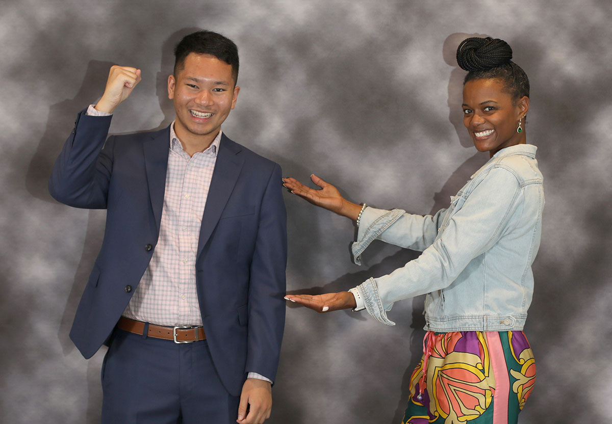 Miguel Villanueva and Jennifer Johnson pose enthusiastically