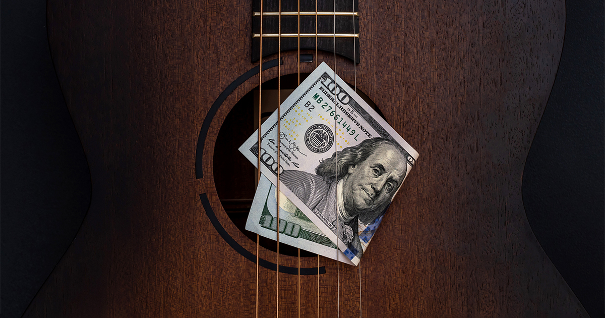 guitar and money