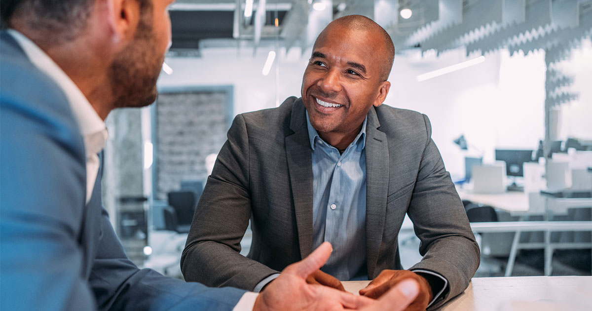 two business professionals talking