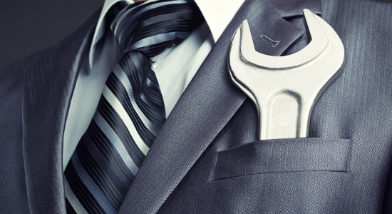 tool in business suit pocket