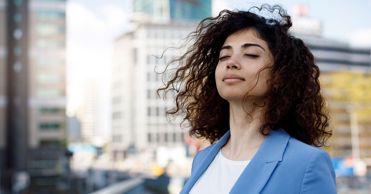 Business professional breathing contentedly