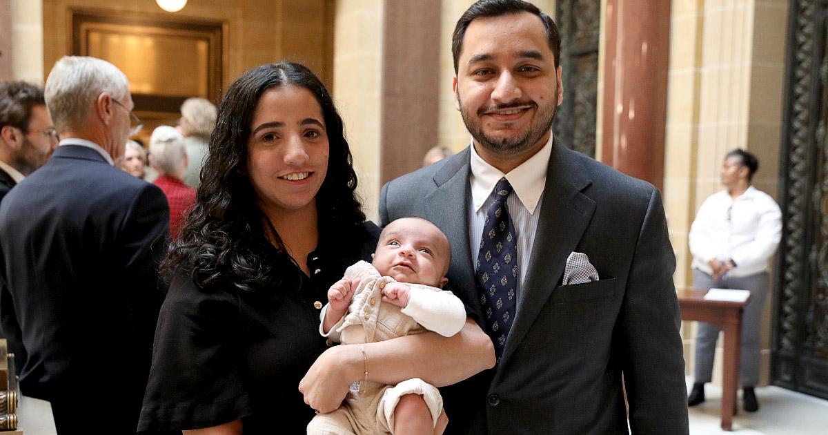 a couple with a baby