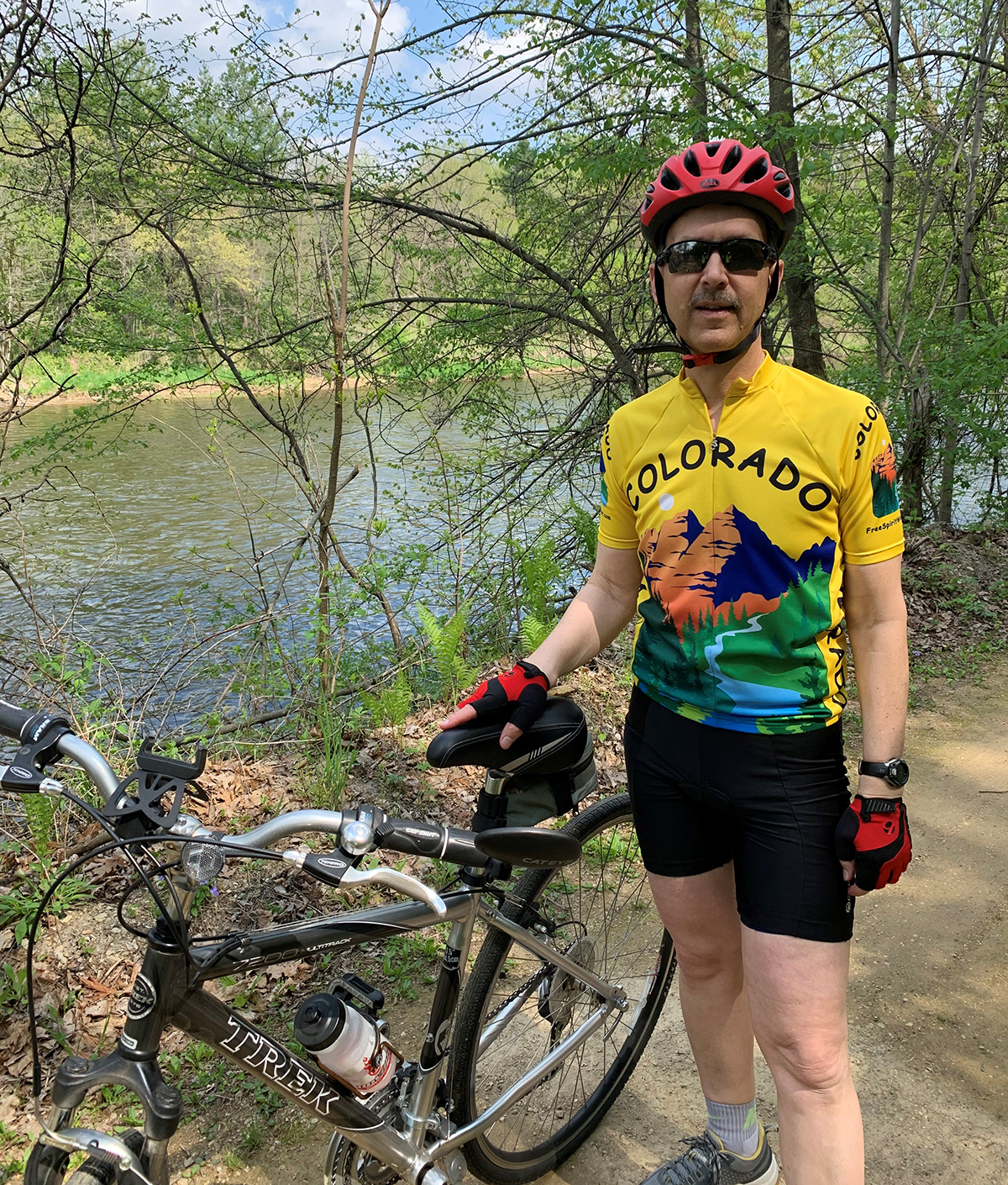 Judge James Babler stands with his bicycle