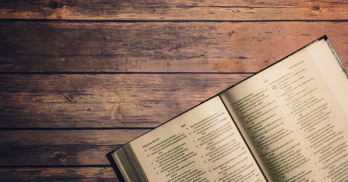 A Bible, Open to Psalm 89, On A Plain Wooden Table