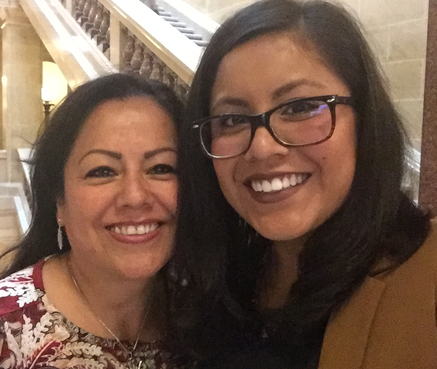 Marisol Gonzalez Castillo and her mother both smile at the camera