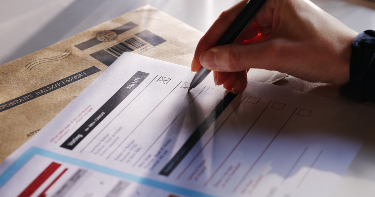 Close Up Of A Right-Handed Person Marking A Ballot With A Ball Point Pen