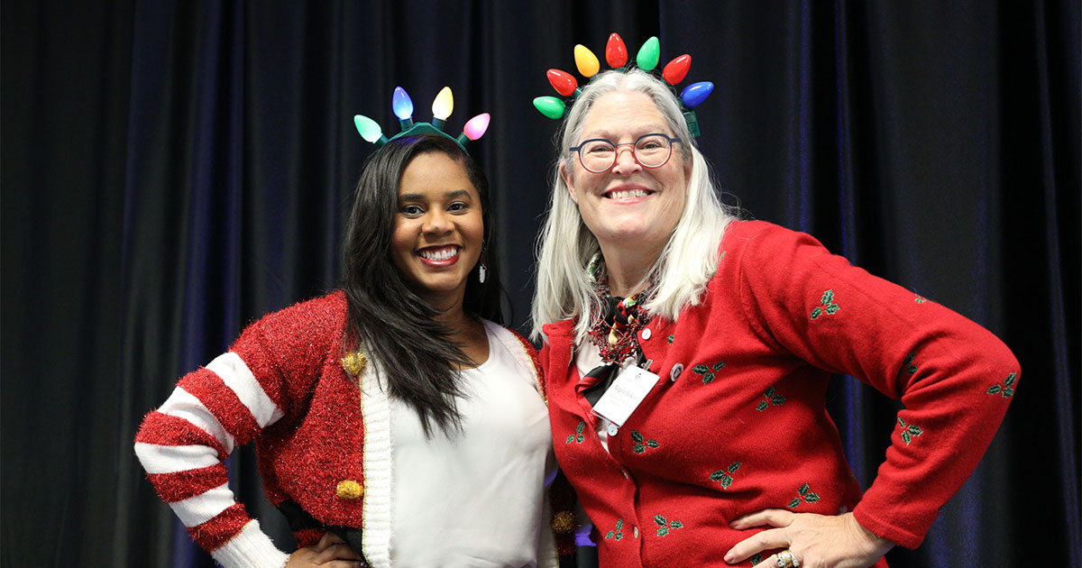Kristen Hardy and Margaret Hickey in festive sweaters