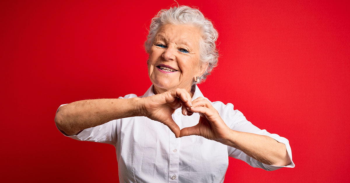 elderly woman shows love