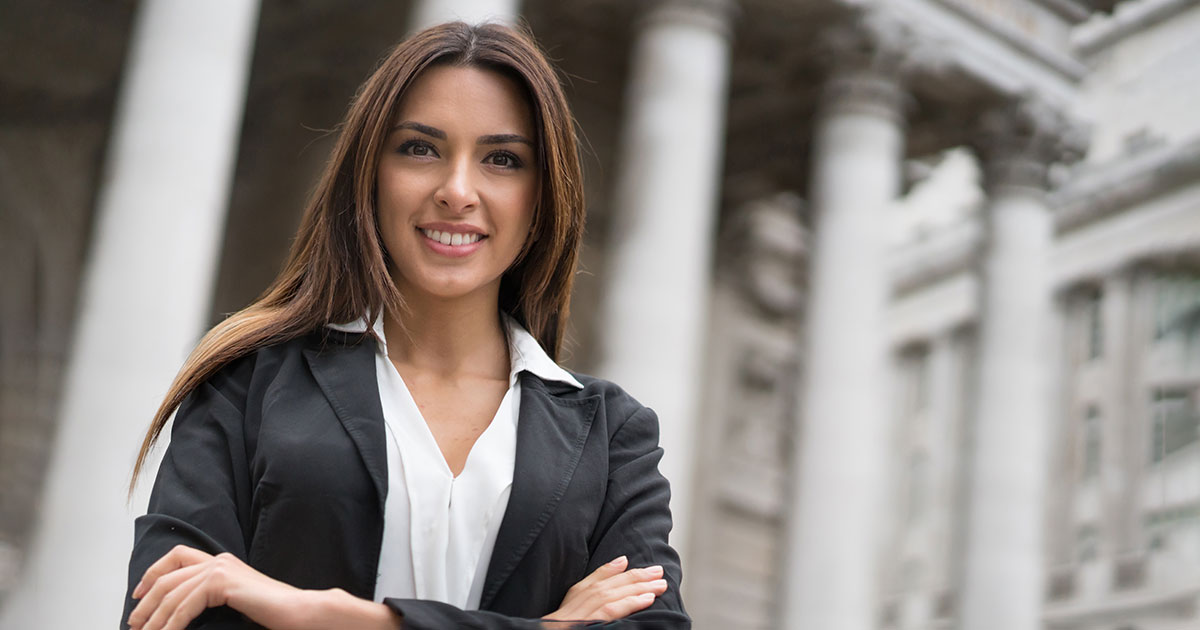 young lawyer in front of courthouse