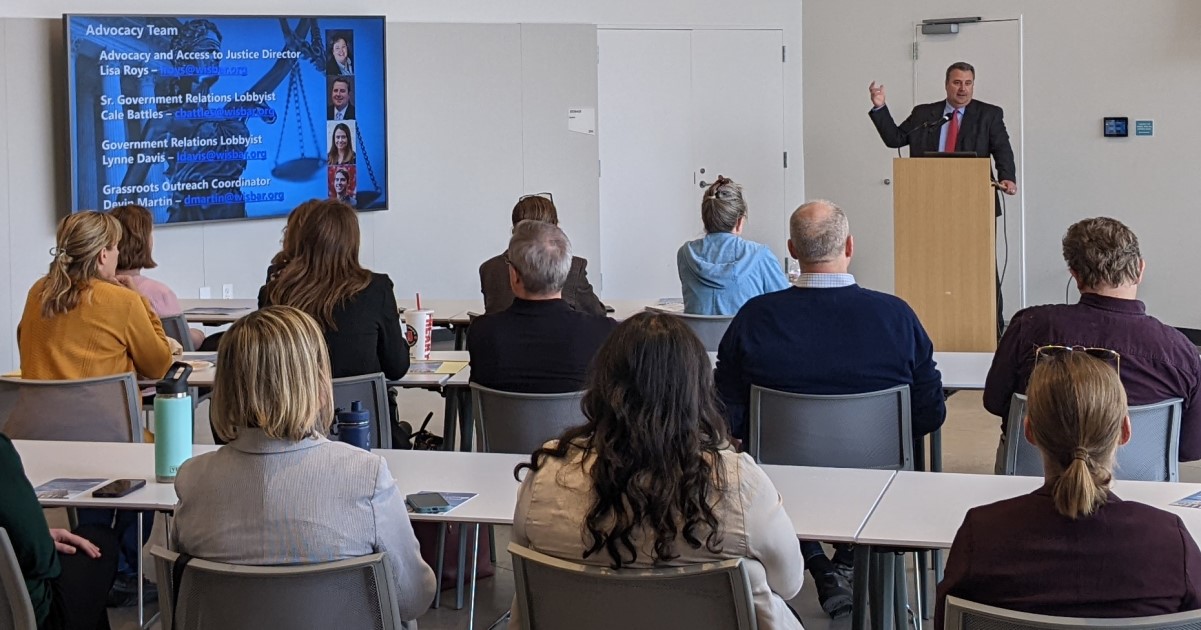 State Bar Senior Lobbyist Cale Battles delivers a presentation to Eau Claire based Women Lawyers of the North