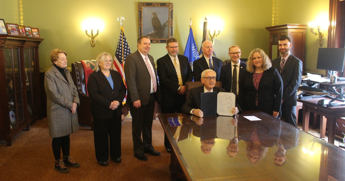 Gov. Evers signing a bill supported by the State Bar's RPPT Section