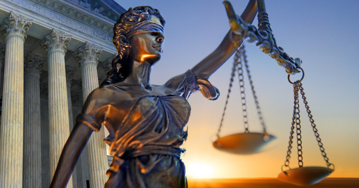 Statue of Justice holding scales