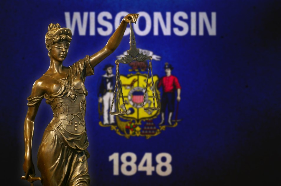 Statue of Justice with Wisconsin Flag