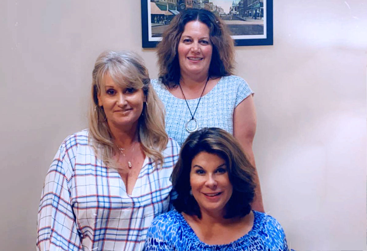 Jennifer Thompson (seated), Rebecca Castonia (upper  left), Colleen Bissett (upper right)