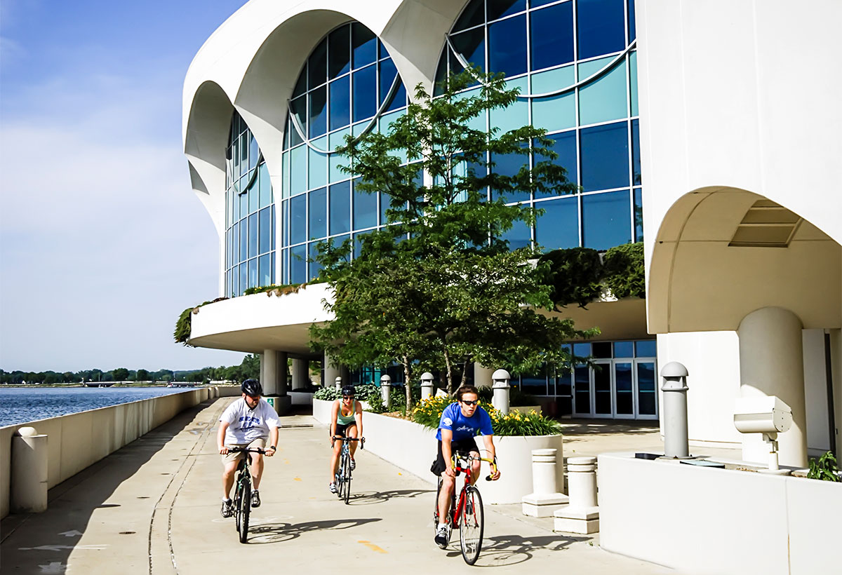 biking by Monona Terrace building