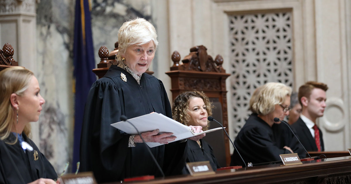 Justice Patience Roggensack administers the oath of office to new admittees