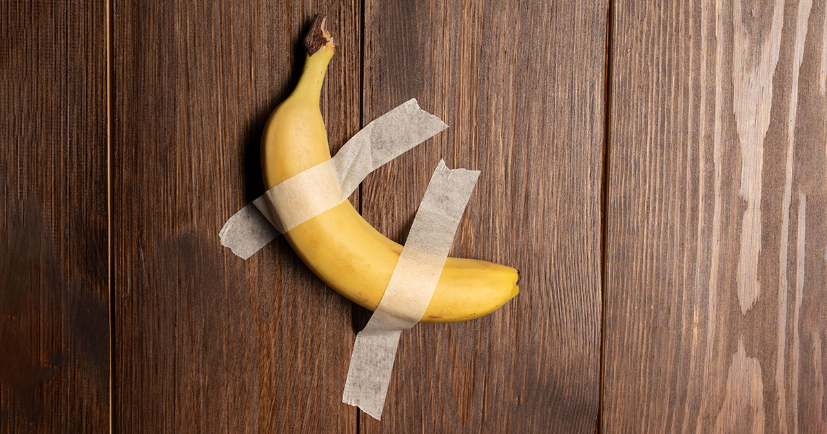Banana taped to a wall