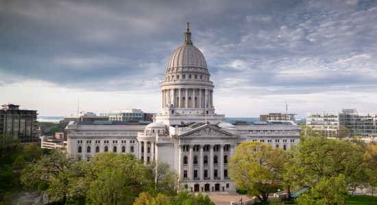 Capitol building under a cloudy day