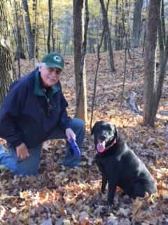 Frank Daily, with his Labrador, Atticus