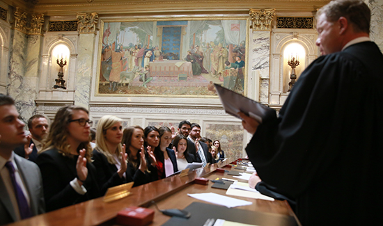 Justice Daniel Kelly administers the Attorney’s Oath