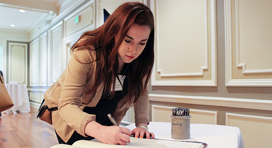 Stephanie Klein signs the Supreme Court Roll book