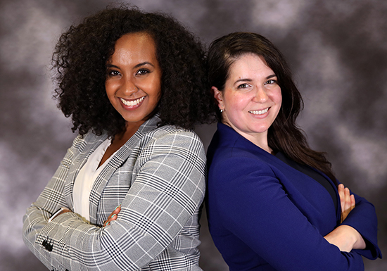 Clerk Julie Leary, right, with Makda Fessahaye of the Wisconsin Department of Corrections.