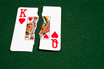 king and queen torn playing cards