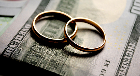 wedding rings on money