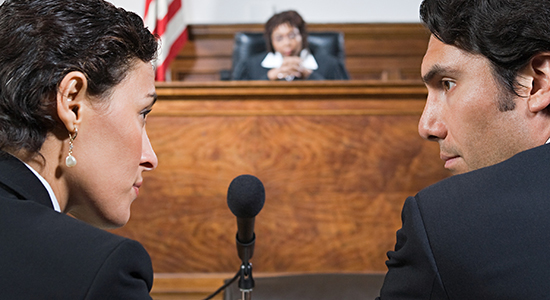 lawyer and defendant in courtroom