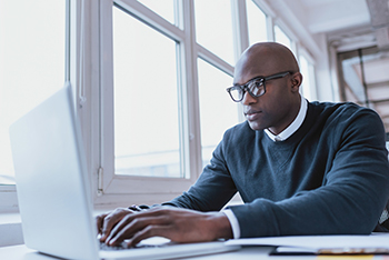 man doing legal research on computer