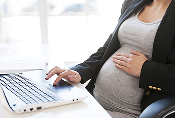 Pregnant woman at work